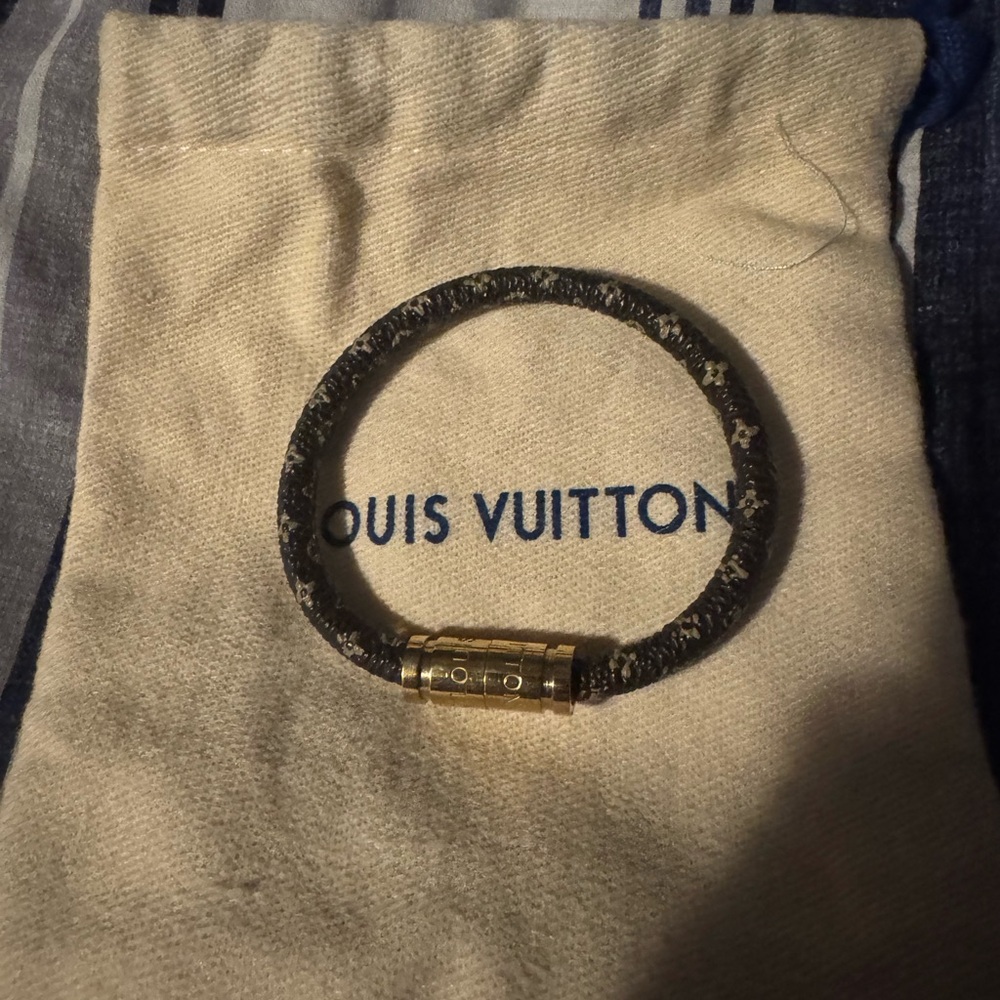Louis Vuitton bracelet with box and dust bag.
Too small for me never worn